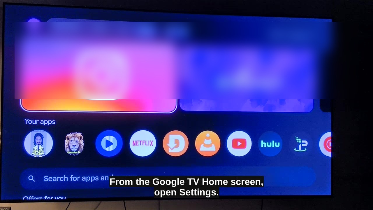 Google TV home screen showing where to open Settings